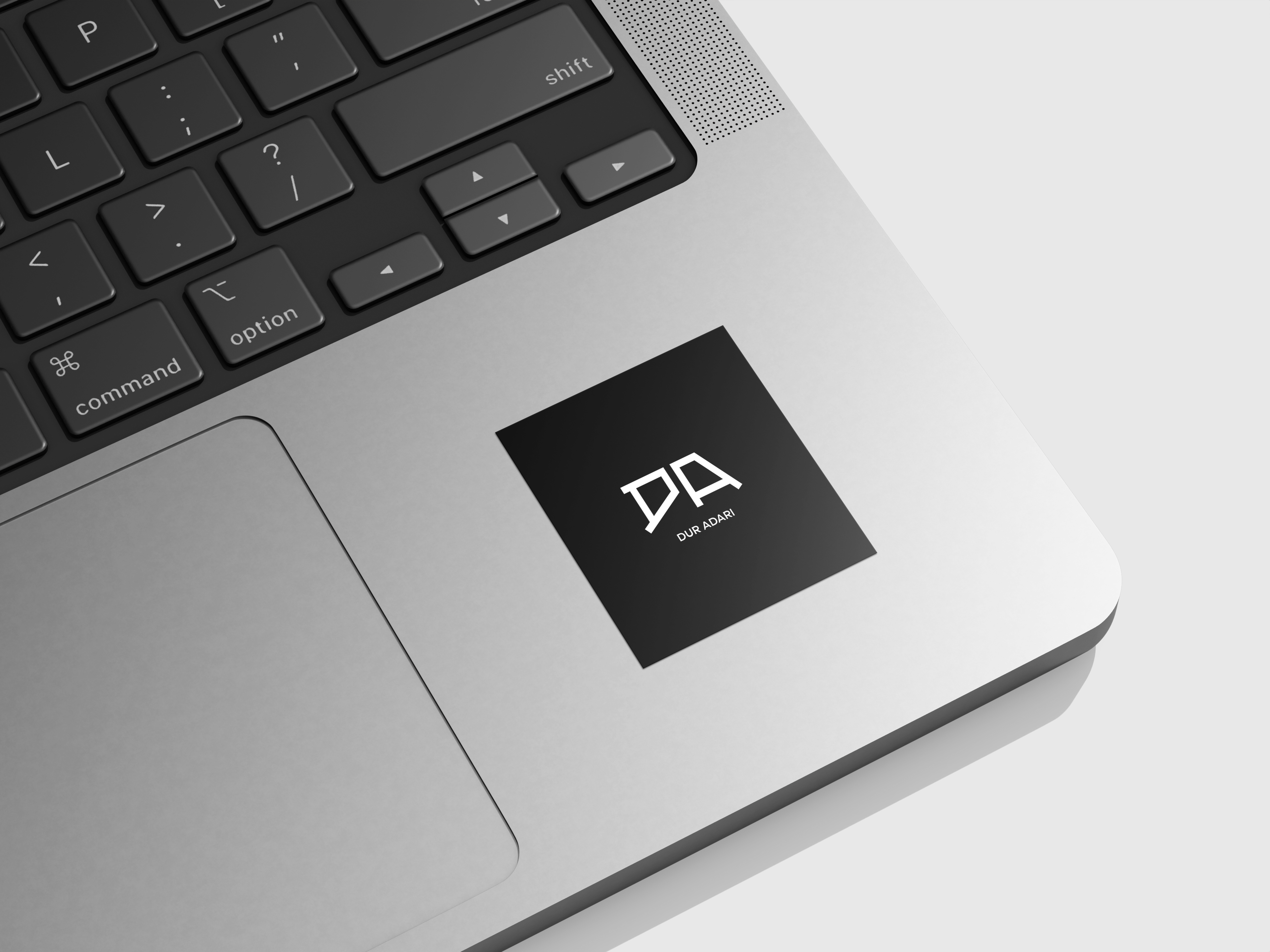 Dura Adari logo sticker on a laptop